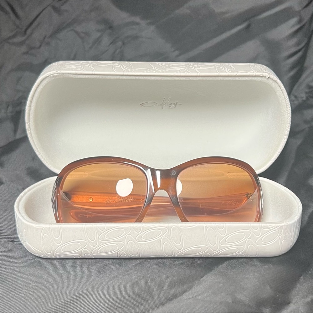 Oakley Embrace Women's Purple Tortoise Sunglasses with White case